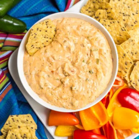 This quick and easy jalapeño cream cheese dip is perfect for parties, served warm with tortilla chips and veggies for dipping. Adjust the spiciness to your liking and get ready to dig in! #jalapenos #jalapenodip #creamcheesedip #appetizers